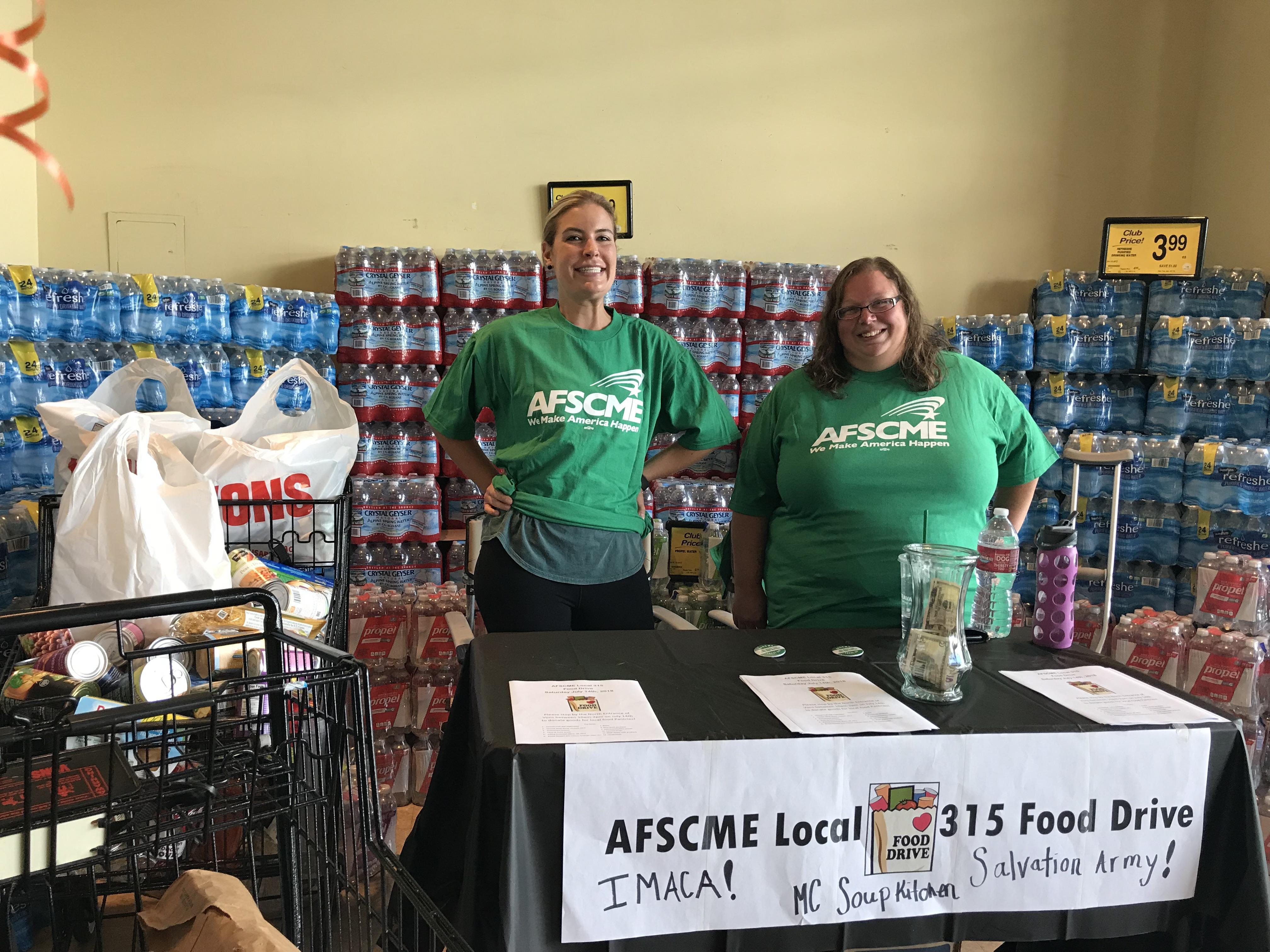 AFSCME Local 315 members Eryn Clark and Laura Bourelle work the booth at the local's food drive in Bishop.